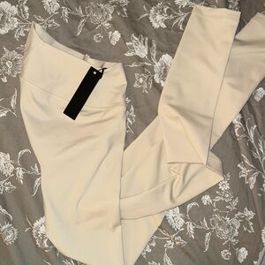 ONERACTIVE- XS. Timeless leggings full length color vanilla. Never worn